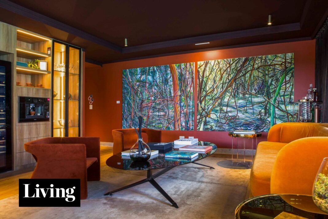 Departamento diseñado por Gaby López Monzón con tonos tierra y obras de arte contemporáneo