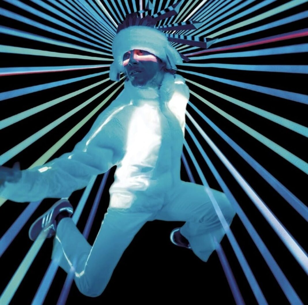 Jamiroquai en concierto con luces de colores